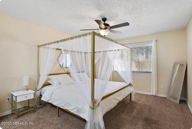 11523 Dunes Way Dr N, Jacksonville, FL 32225 - carpeted bedroom featuring a textured ceiling, baseboards, and ceiling fan