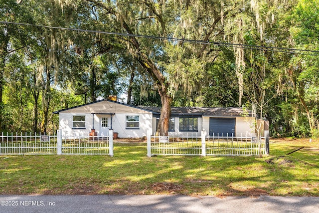 single story home with a garage