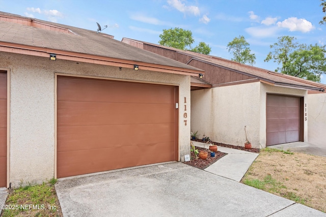 1167 Romaine Cir E, Jacksonville, FL 32225 - view of front of house with stucco siding and concrete driveway