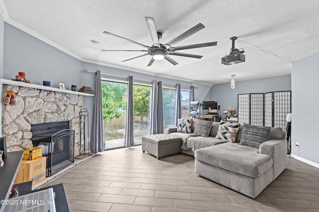 1167 Romaine Cir E, Jacksonville, FL 32225 - living room featuring a textured ceiling, a ceiling fan, a stone fireplace, wood finished floors, and ornamental molding