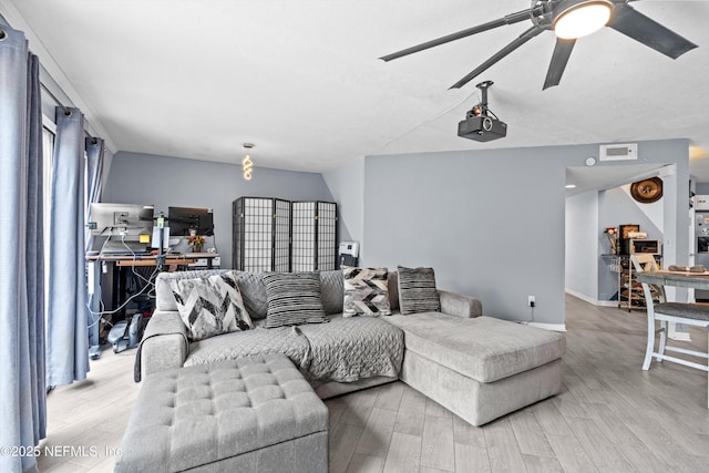 1167 Romaine Cir E, Jacksonville, FL 32225 - living room featuring wood finished floors and ceiling fan