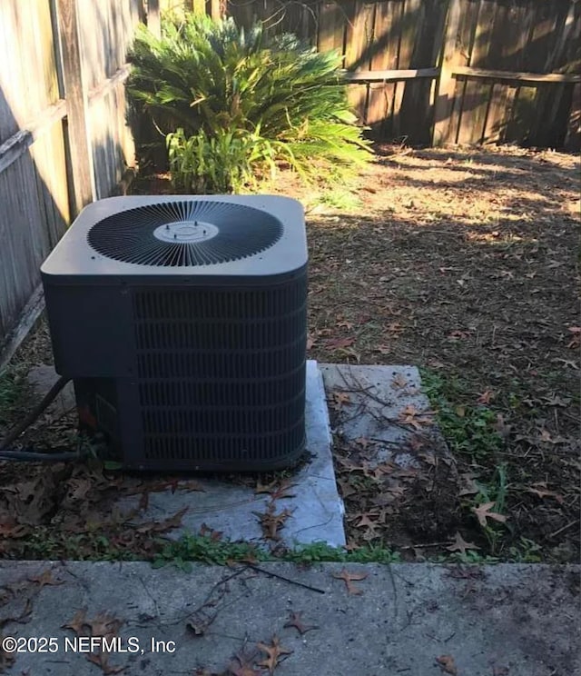 1167 Romaine Cir E, Jacksonville, FL 32225 - exterior view of central AC and fence