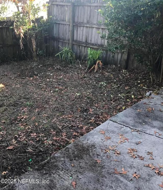 1167 Romaine Cir E, Jacksonville, FL 32225 - view of yard featuring fence