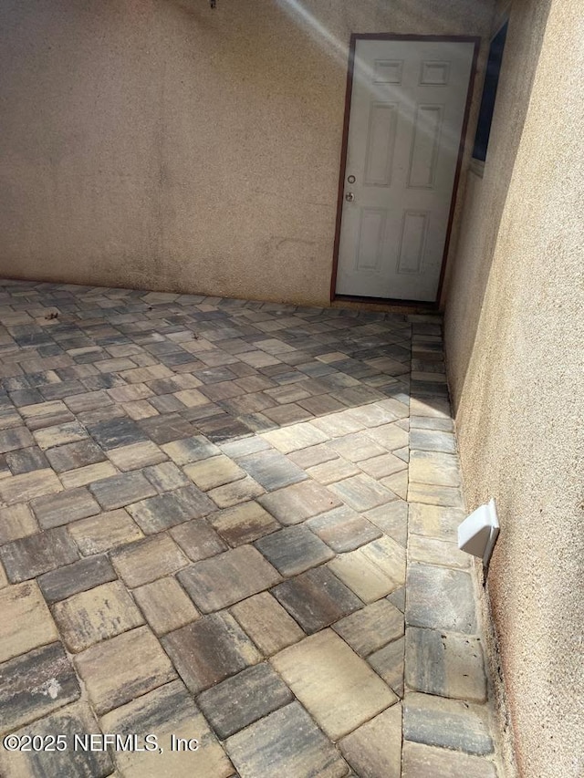 1167 Romaine Cir E, Jacksonville, FL 32225 - doorway to property with stucco siding