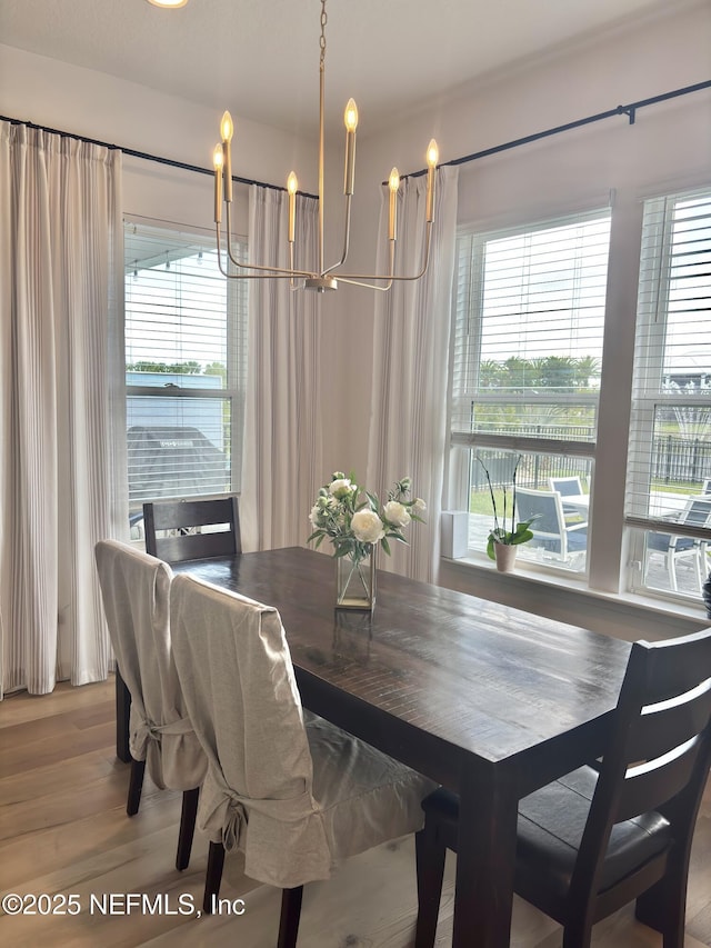 627 Rum Runner Way, Saint Johns, FL 32259 - dining space featuring a chandelier and wood finished floors