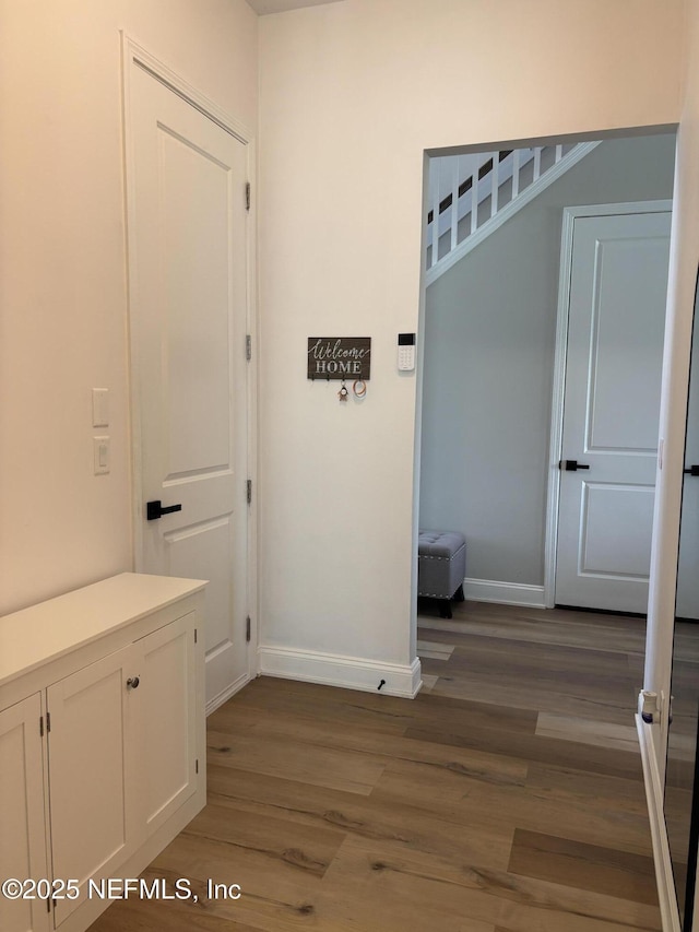 627 Rum Runner Way, Saint Johns, FL 32259 - hallway with wood finished floors and baseboards