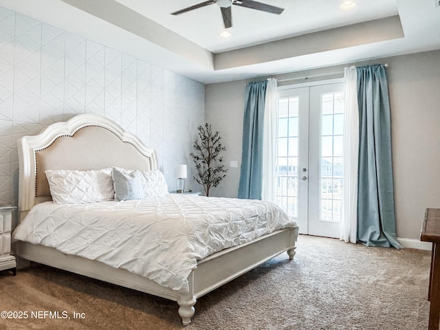 627 Rum Runner Way, Saint Johns, FL 32259 - bedroom featuring carpet flooring, access to outside, a tray ceiling, ceiling fan, and recessed lighting