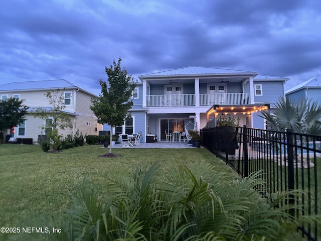 627 Rum Runner Way, Saint Johns, FL 32259 - back of property featuring ceiling fan, a patio, a balcony, a metal roof, and a standing seam roof