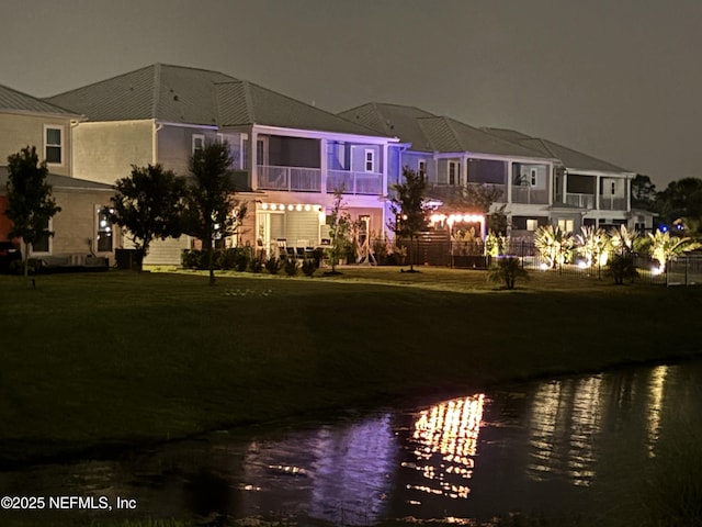 627 Rum Runner Way, Saint Johns, FL 32259 - view of front facade featuring a water view and a yard