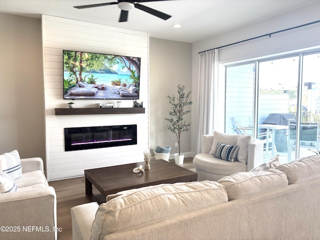 627 Rum Runner Way, Saint Johns, FL 32259 - living room with wood finished floors, ceiling fan, recessed lighting, and a fireplace