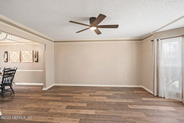 5950 Orchard Pond Dr, Fleming Island, FL 32003 - unfurnished room with a ceiling fan, a textured ceiling, wood finished floors, crown molding, and baseboards