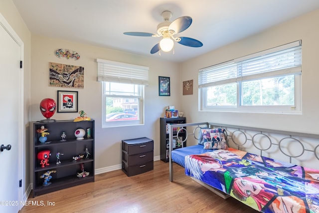 5520 Hyde Grove Ave, Jacksonville, FL 32210 - bedroom featuring light wood-style flooring, baseboards, and a ceiling fan