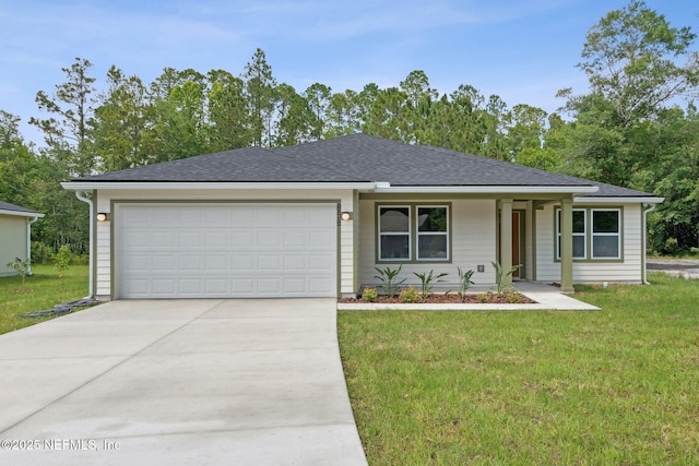 view of front of property featuring driveway, a front lawn, a garage, and roof with shingles