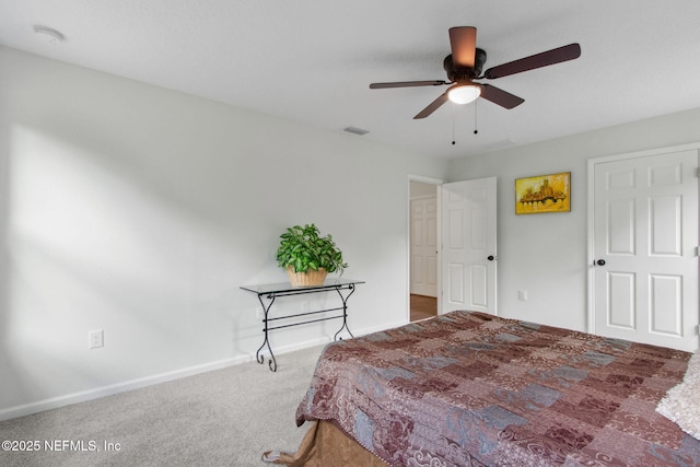 bedroom featuring carpet, baseboards, and a ceiling fan