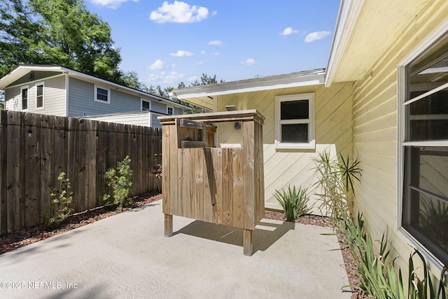 view of patio / terrace with fence