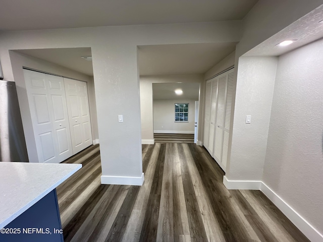 3133 Gilmore St, Jacksonville, FL 32205 - hallway with baseboards and dark wood-style floors