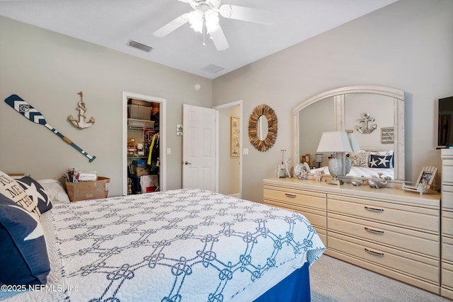 400 N Landguard Rd, Saint Augustine, FL 32092 - carpeted bedroom featuring a walk in closet, ceiling fan, and a closet