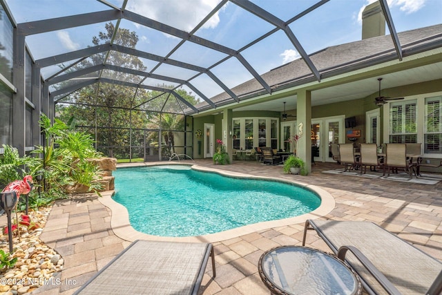 400 N Landguard Rd, Saint Augustine, FL 32092 - swimming pool with a ceiling fan, a patio, french doors, glass enclosure, and outdoor dining area