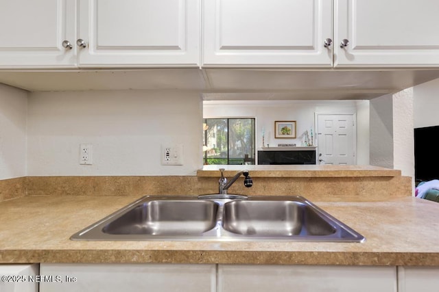 100 Fairway Park Blvd Unit 802, Ponte Vedra, FL 32082 - kitchen with a sink and white cabinetry