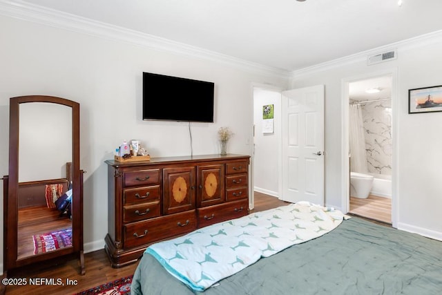 100 Fairway Park Blvd Unit 802, Ponte Vedra, FL 32082 - bedroom with crown molding, dark wood-style flooring, connected bathroom, and baseboards