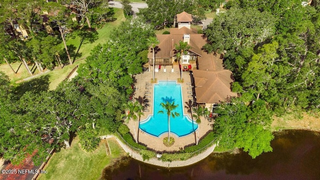 100 Fairway Park Blvd Unit 802, Ponte Vedra, FL 32082 - aerial view of property and surrounding area featuring a pool and a tree filled landscape