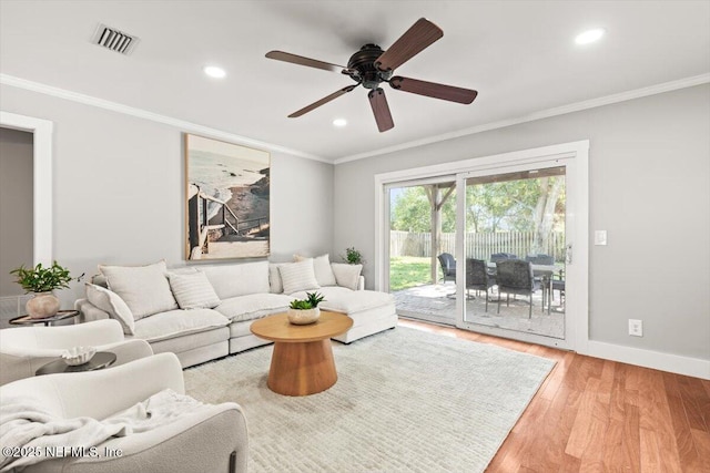 1659 Sea Oats Dr, Atlantic Beach, FL 32233 - living area with ornamental molding, a ceiling fan, wood finished floors, recessed lighting, and baseboards