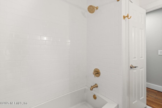 1659 Sea Oats Dr, Atlantic Beach, FL 32233 - full bath featuring washtub / shower combination and wood finished floors