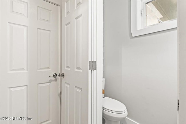 1659 Sea Oats Dr, Atlantic Beach, FL 32233 - bathroom featuring toilet and baseboards