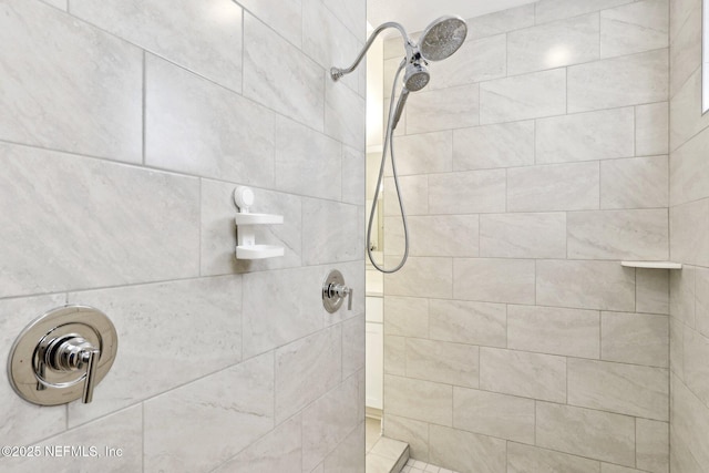 full bathroom with tiled shower