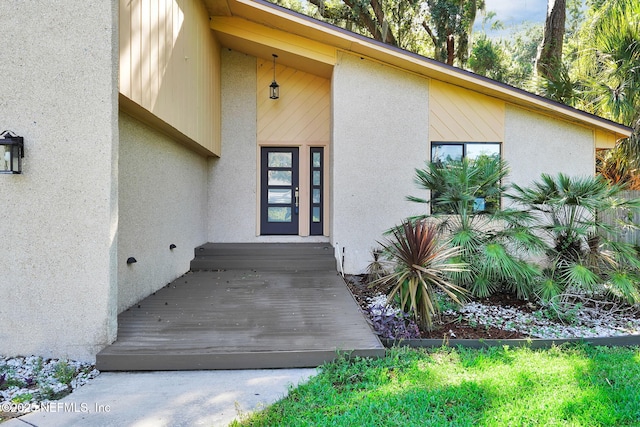 2032 Sandpiper Pt, Neptune Beach, FL 32266 - view of exterior entry with stucco siding