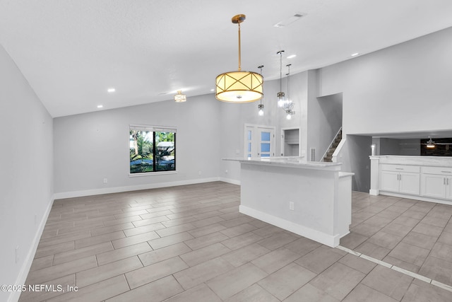2032 Sandpiper Pt, Neptune Beach, FL 32266 - unfurnished living room featuring recessed lighting, high vaulted ceiling, and stairs