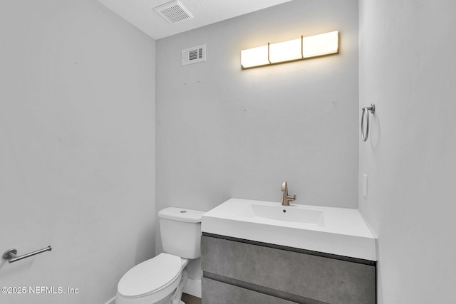 2032 Sandpiper Pt, Neptune Beach, FL 32266 - half bathroom with toilet and vanity