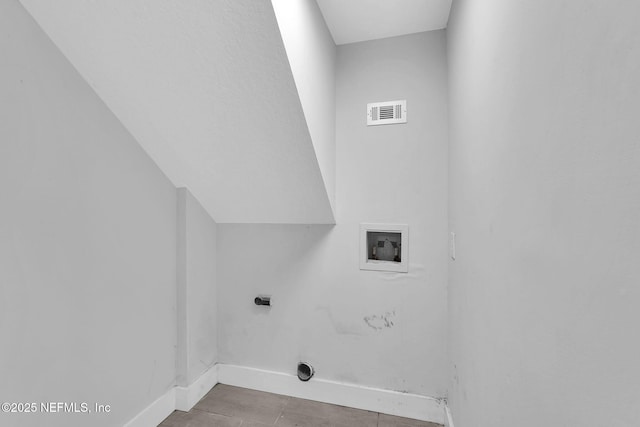 2032 Sandpiper Pt, Neptune Beach, FL 32266 - laundry area with hookup for a washing machine, electric dryer hookup, and tile patterned floors
