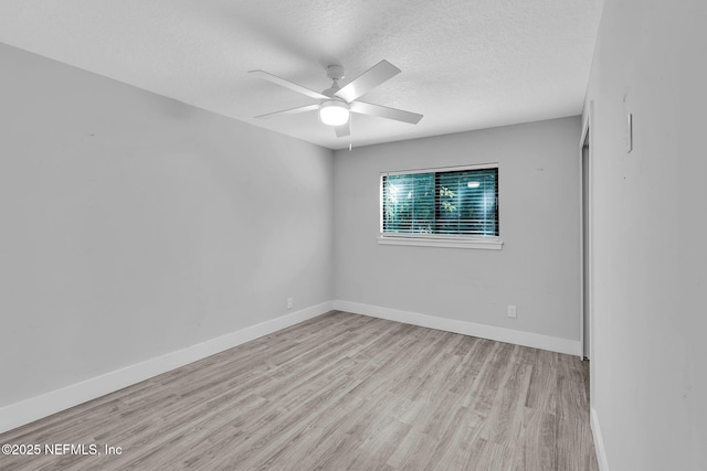 2032 Sandpiper Pt, Neptune Beach, FL 32266 - empty room featuring wood finished floors, ceiling fan, and a textured ceiling