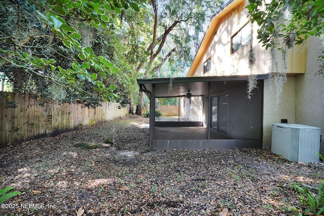 2032 Sandpiper Pt, Neptune Beach, FL 32266 - fenced backyard featuring a sunroom