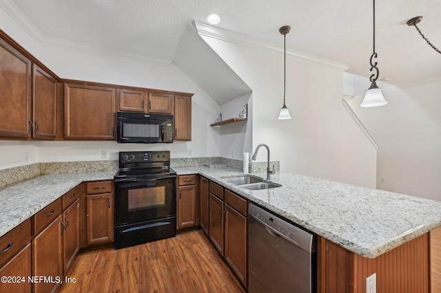 165 Amistad Dr, Saint Augustine, FL 32086 - kitchen with black appliances, a sink, a peninsula, wood finished floors, and open shelves