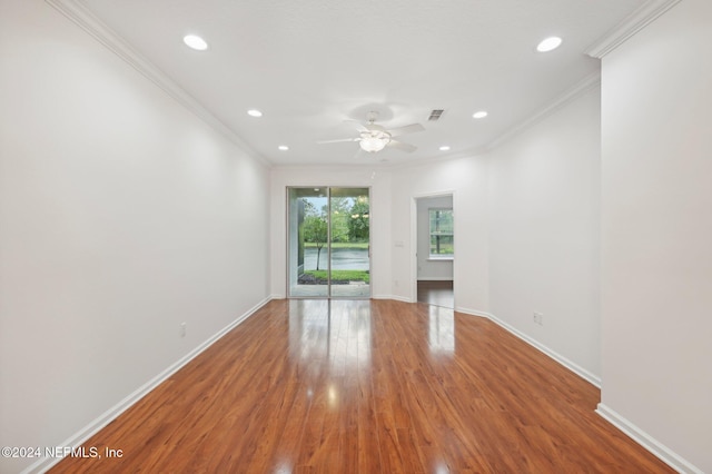 165 Amistad Dr, Saint Augustine, FL 32086 - empty room featuring crown molding, ceiling fan, wood finished floors, baseboards, and recessed lighting