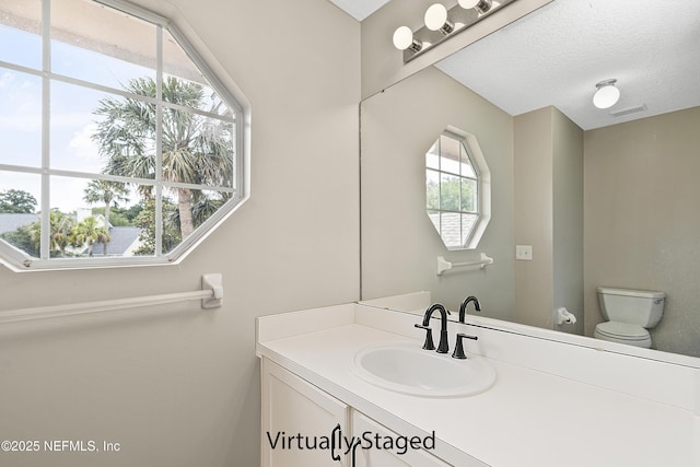 half bath with toilet and vanity