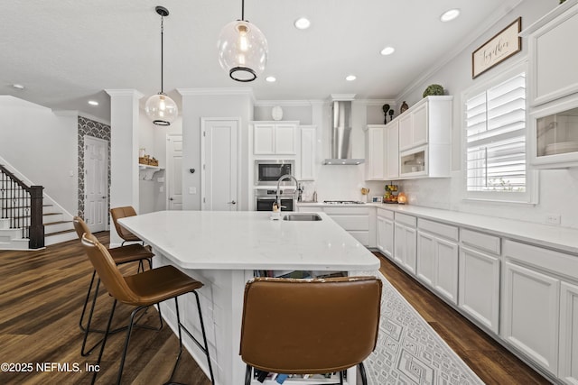 131 Seabrook Dr, Ponte Vedra, FL 32081 - kitchen featuring wall chimney range hood, a sink, ornamental molding, white gas stovetop, and white cabinetry