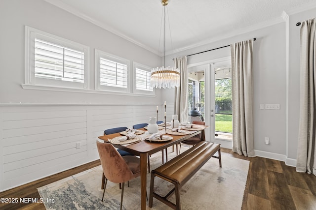 131 Seabrook Dr, Ponte Vedra, FL 32081 - dining area featuring crown molding, dark wood-style floors, plenty of natural light, a chandelier, and baseboards
