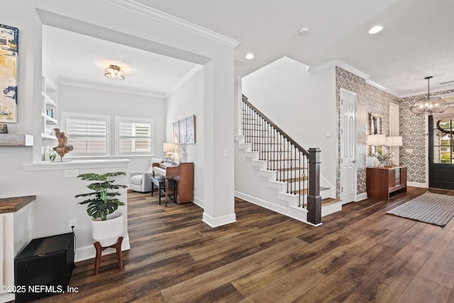 131 Seabrook Dr, Ponte Vedra, FL 32081 - entryway featuring ornamental molding, baseboards, wood finished floors, stairs, and a chandelier