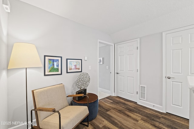 131 Seabrook Dr, Ponte Vedra, FL 32081 - living area featuring dark wood-type flooring and baseboards
