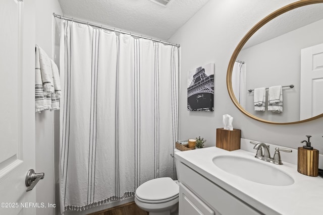 131 Seabrook Dr, Ponte Vedra, FL 32081 - full bath featuring a textured ceiling, vanity, and toilet