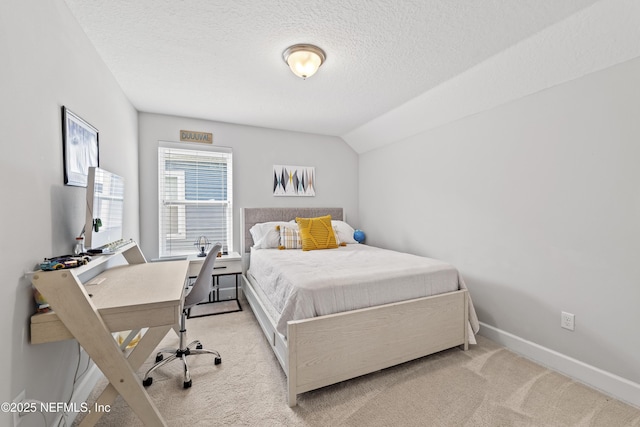 131 Seabrook Dr, Ponte Vedra, FL 32081 - bedroom featuring carpet, a textured ceiling, baseboards, a desk, and lofted ceiling