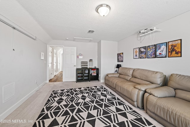 131 Seabrook Dr, Ponte Vedra, FL 32081 - living area featuring light carpet, baseboards, a textured ceiling, and lofted ceiling