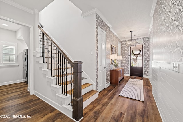 131 Seabrook Dr, Ponte Vedra, FL 32081 - foyer with ornamental molding, stairway, baseboards, wood finished floors, and wallpapered walls