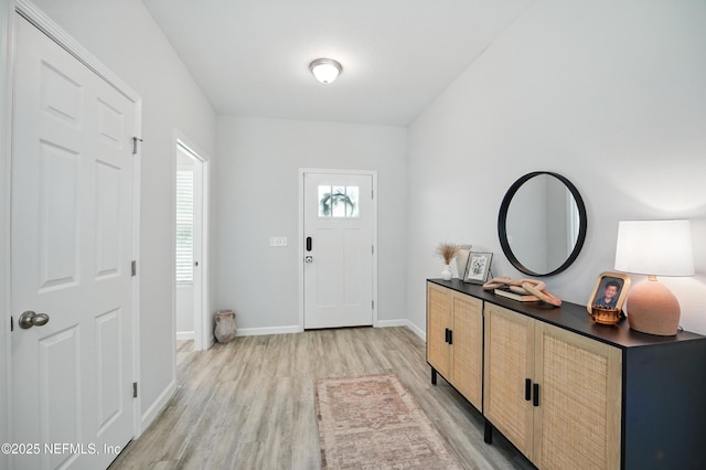 2483 Cortez Rd, Jacksonville, FL 32246 - foyer entrance with light wood-type flooring and baseboards