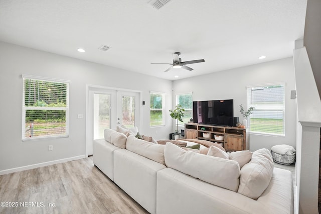 2483 Cortez Rd, Jacksonville, FL 32246 - living room featuring ceiling fan, light wood-type flooring, healthy amount of natural light, recessed lighting, and baseboards