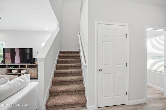2483 Cortez Rd, Jacksonville, FL 32246 - stairs featuring wood finished floors, baseboards, and recessed lighting
