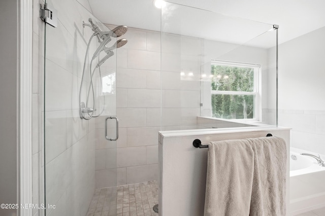 2483 Cortez Rd, Jacksonville, FL 32246 - full bathroom featuring a stall shower and a bath